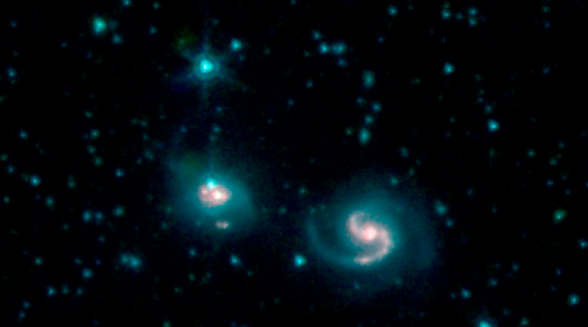 Smaller bright galaxies are seen by the Spitzer space telescope.