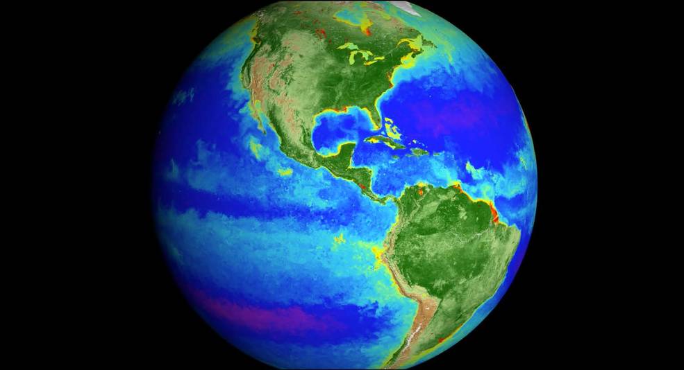 Earth is seen with life indicated in bright colors in the ocean and on land.