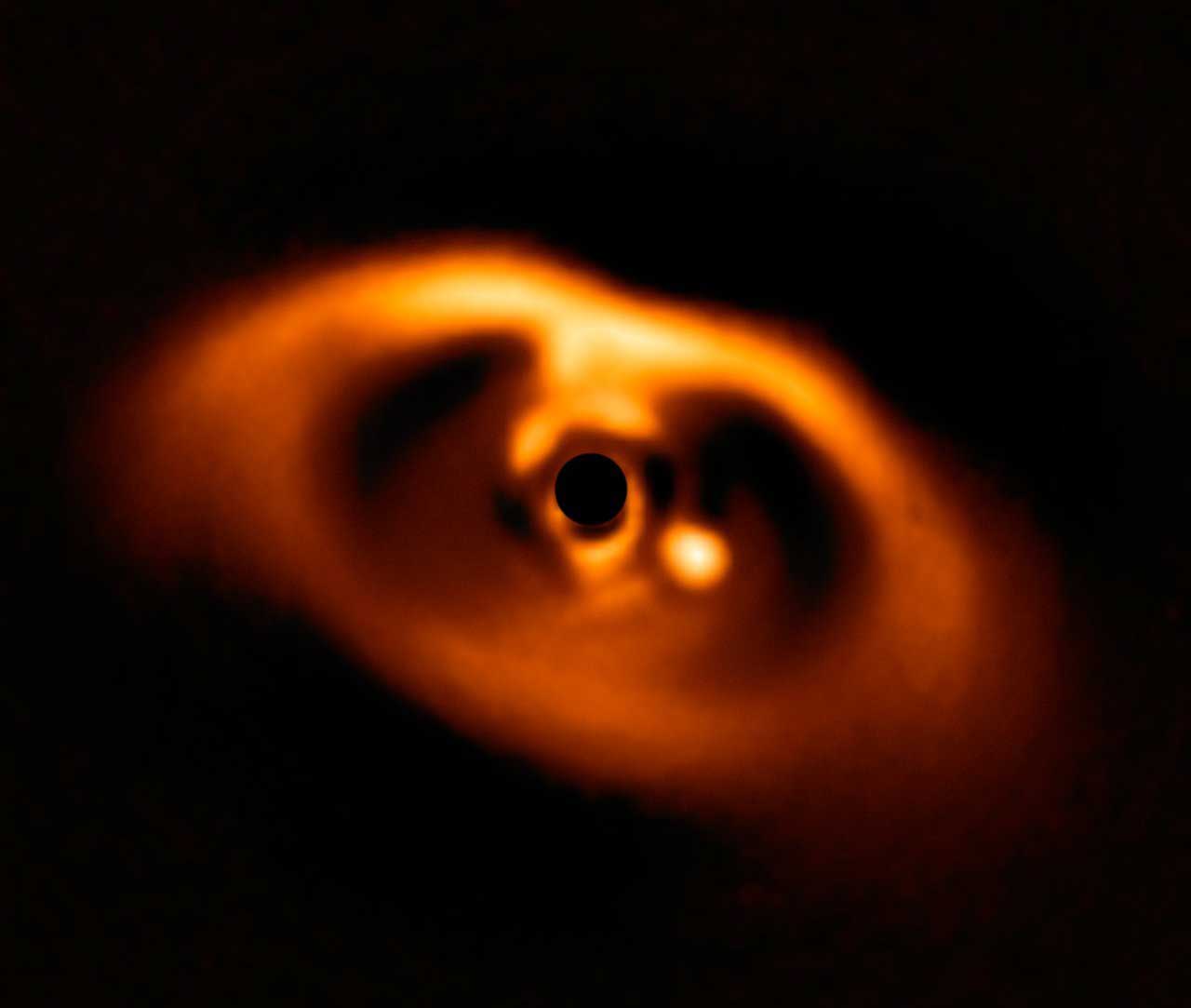ESO baby planet is seen in orange dust disk 