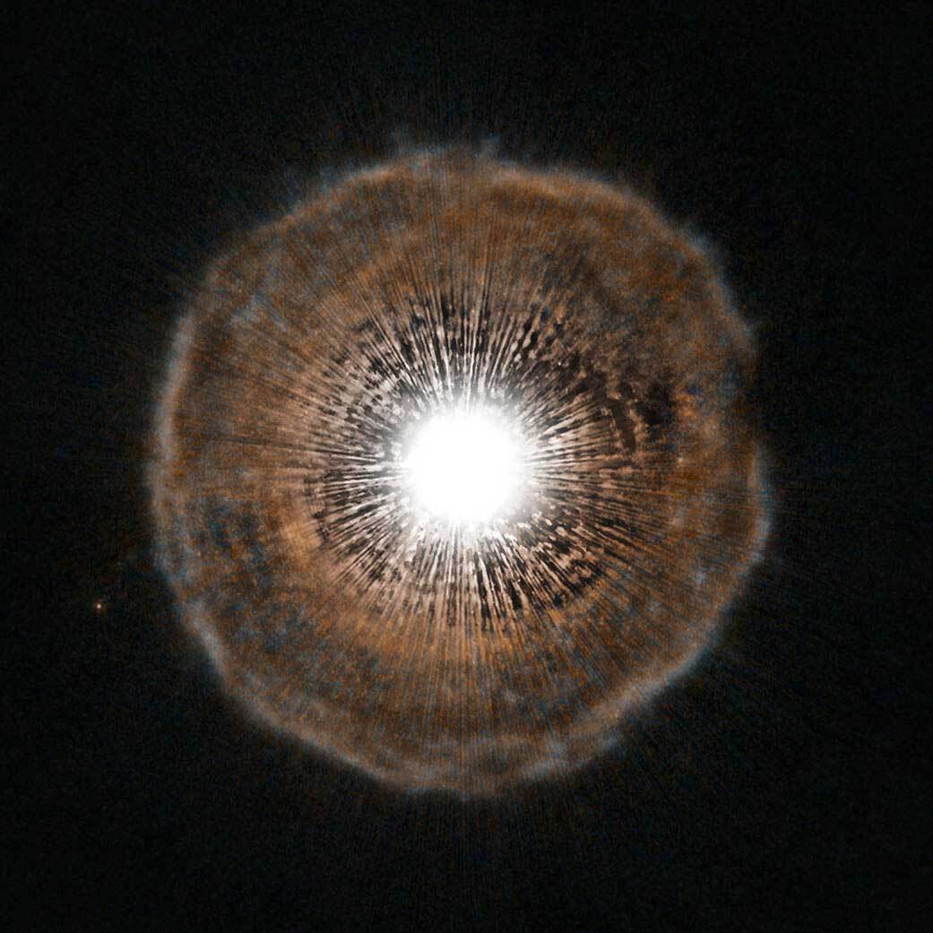 Red giant star surrounded by bubble of gas