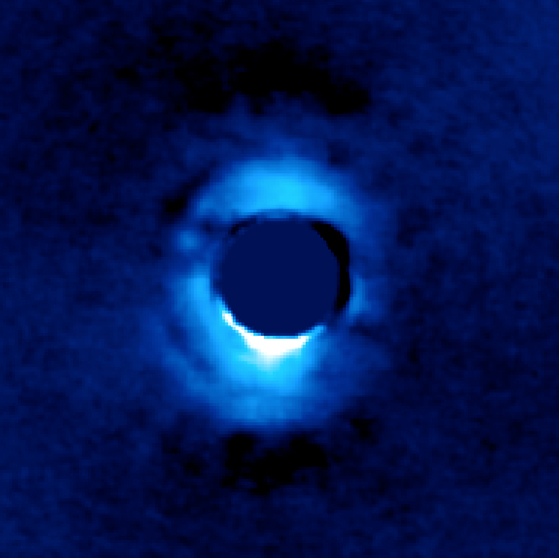 Vortex coronagraph images planetary material