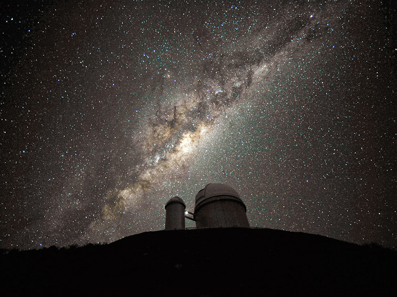 Milky Way Galaxy above telescope.