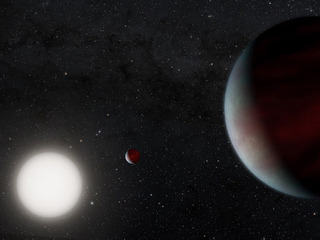 Artist's rendering of two hot, Saturn-sized planets orbiting the star, EPIC 249731291.