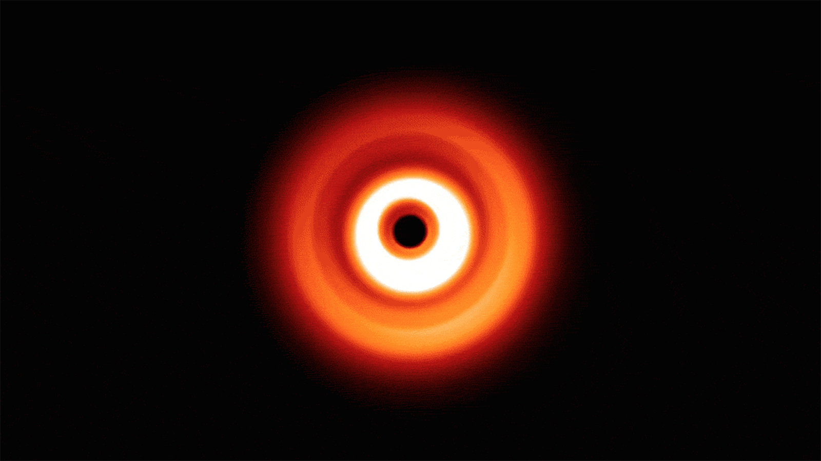 Animated spinning image of the disk possibly hiding a planet.