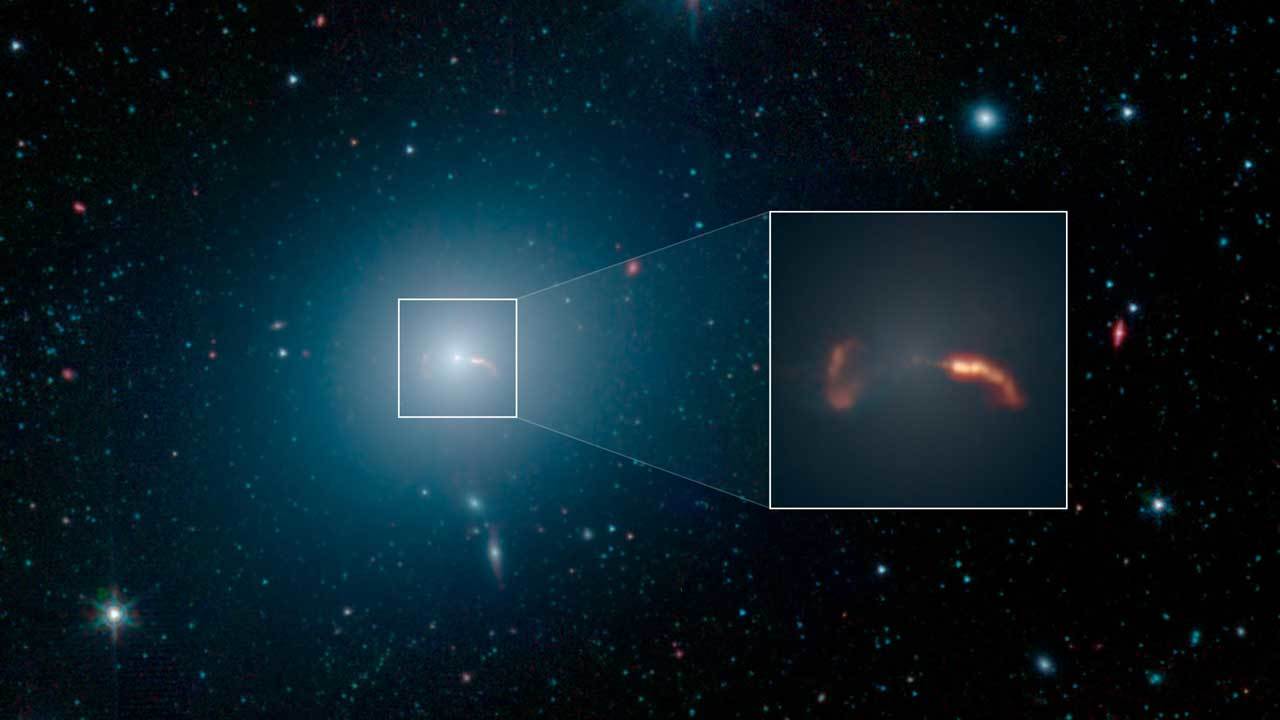 NASA's Spitzer space telescope imaged the M87 galaxy seen as a bright region amid other clusters.