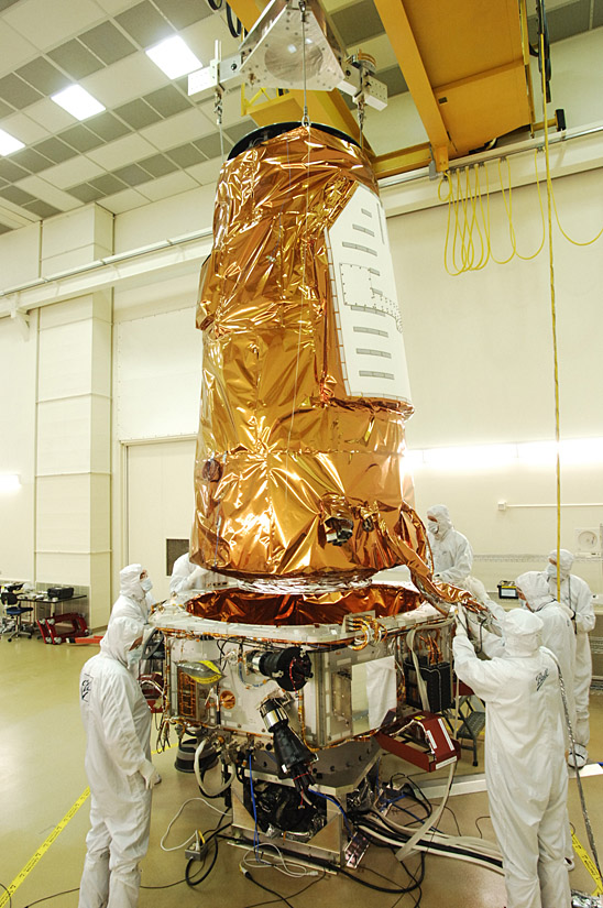 Kepler Photometer Being Lowered onto Spacecraft 